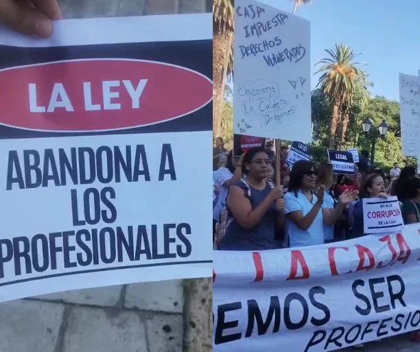 Profesionales de Salta en reunión analizando documentos relacionados con la Ley 8444.